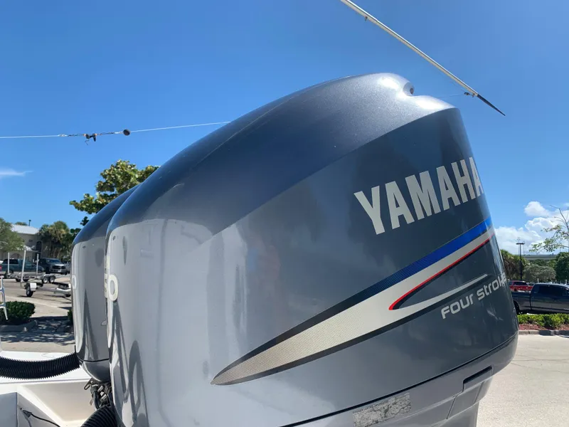 Slide: The Image of Close-up of Yamaha four-stroke outboard motor on 2003 Contender 35 Express Side Console boat. - 35