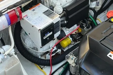 Slide: The Image of Engine compartment of a 2014 Four Winns 355V boat. - 18