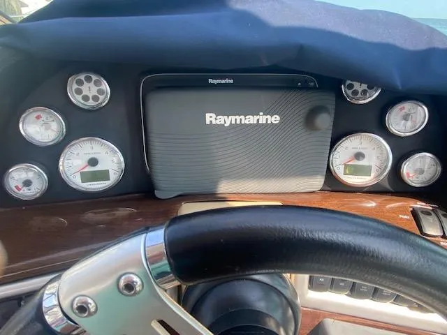 Slide: The Image of Dashboard of a 2014 Four Winns 355V boat with Raymarine navigation system. - 20