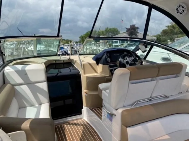 Slide: The Image of Interior of 2014 Four Winns 355V boat with seating and helm station. - 37