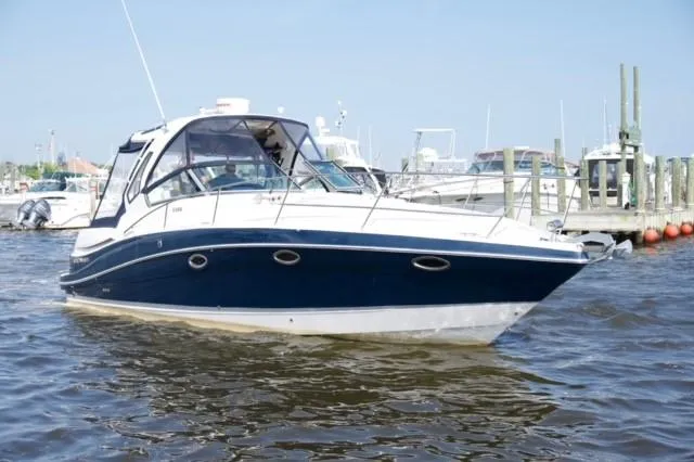 Slide: The Image of 2014 Four Winns 355V boat docked in a marina. - 40