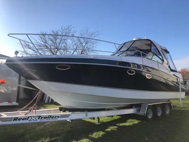 Slide: The Image of 2014 Four Winns 355V boat on Real X Trailers. - 5