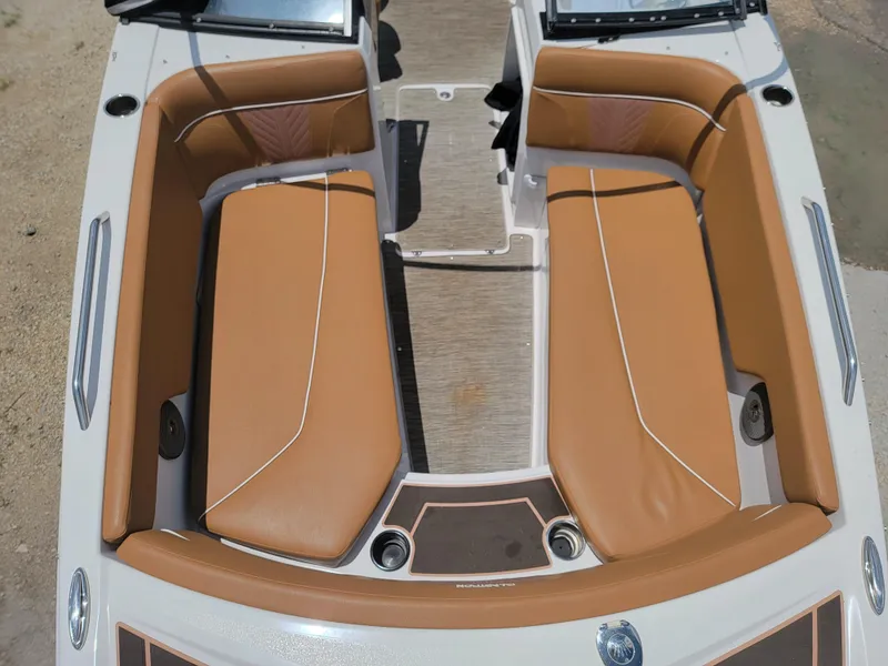 Slide: The Image of 2019 Glastron GTD 220 boat interior with tan leather seating. - 20