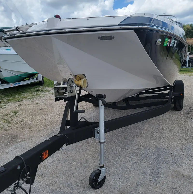 Slide: The Image of 2019 Glastron GTD 220 boat on a trailer, front view. - 30