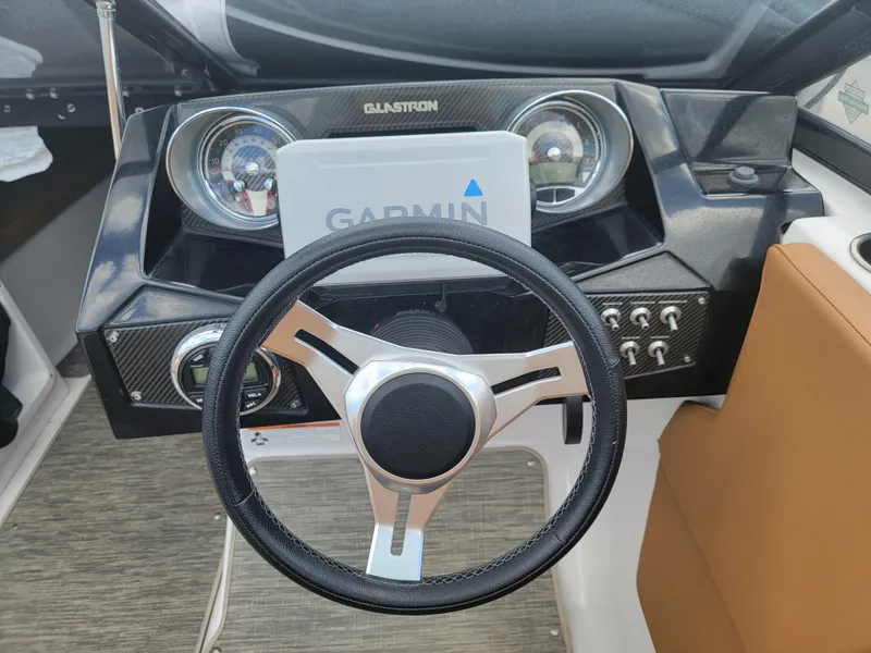 Slide: The Image of 2019 Glastron GTD 220 boat dashboard with Garmin navigation system. - 6