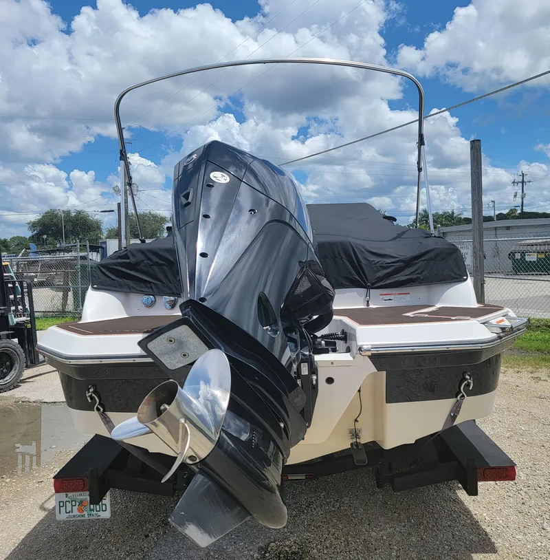 Slide: The Image of 2019 Glastron GTD 220 boat with outboard motor, rear view. - 7
