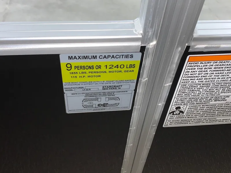 Slide: The Image of 2024 Starcraft LX22 R capacity label, 9 persons or 1240 lbs, 115 H.P. motor. - 10