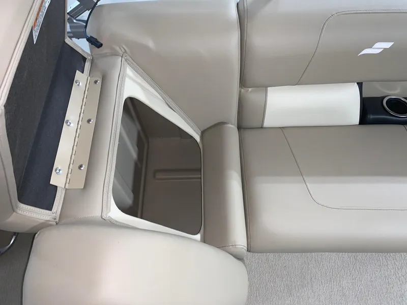 Slide: The Image of 2024 Starcraft LX22 R boat interior storage compartment and seating. - 5