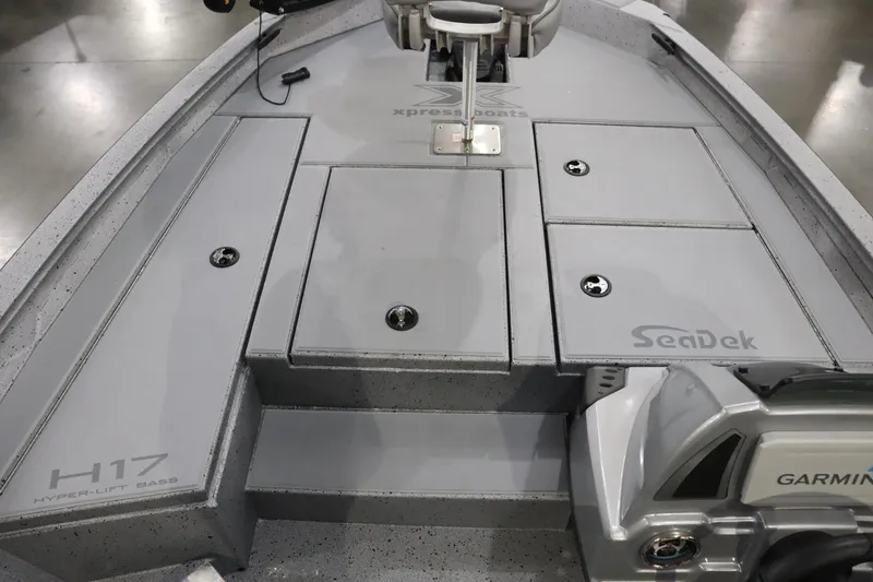 Slide: The Image of 2023 Xpress H17 boat deck with SeaDek flooring and Garmin equipment. - 3