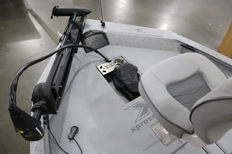 Slide: The Image of 2023 Xpress H17 boat interior with trolling motor and seating. - 4