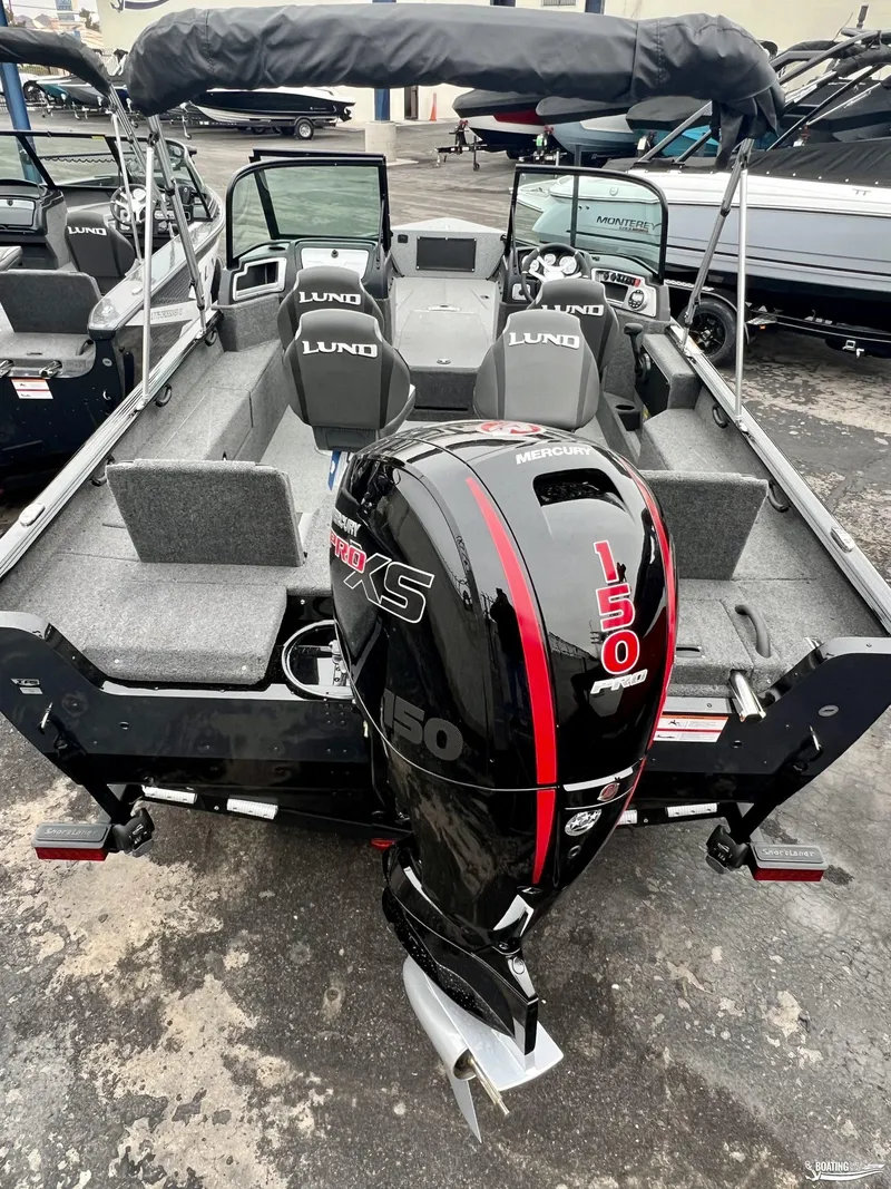 Slide: The Image of 2022 Lund 1875 Impact XS boat with Mercury 150 engine, interior view. - 1