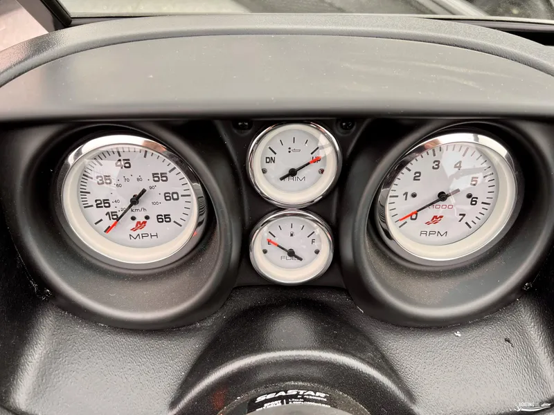 Slide: The Image of Dashboard of 2022 Lund 1875 Impact XS with speedometer and RPM gauges. - 6