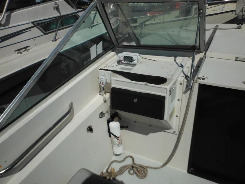 Slide: The Image of 1989 Wellcraft V20 Steplift boat interior with dashboard and windshield. - 10