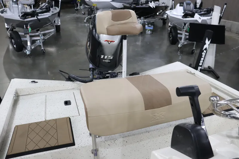 Slide: The Image of 2023 Xpress H190 Bay boat with Yamaha 115 engine in showroom. - 7