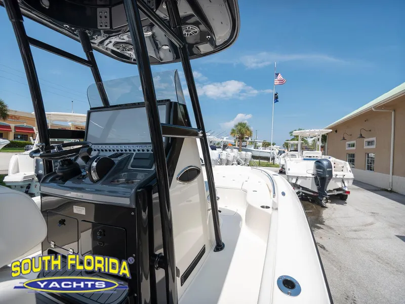 Slide: The Image of 2023 ShearWater 260 Carolina boat at South Florida Yachts dealership. - 11