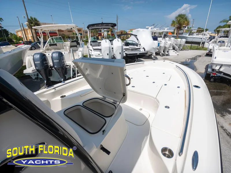 Slide: The Image of 2023 ShearWater 260 Carolina SS boat at South Florida Yachts dealership. - 13