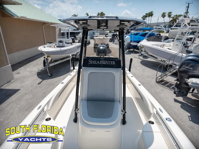 Slide: The Image of 2023 ShearWater 260 Carolina SS boat at South Florida Yachts dealership. - 14