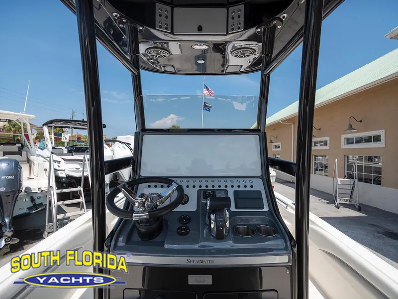 Slide: The Image of 2023 ShearWater 260 Carolina boat dashboard at South Florida Yachts dealership. - 17