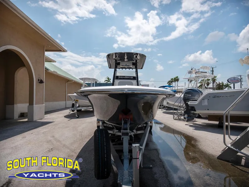 Slide: The Image of 2023 ShearWater 260 Carolina SS boat at South Florida Yachts dealership. - 2