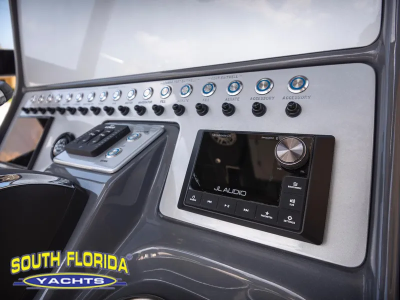 Slide: The Image of Control panel of 2023 ShearWater 260 Carolina boat with JL Audio system. - 20