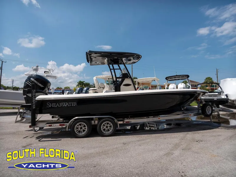 Slide: The Image of 2023 ShearWater 260 Carolina SS boat on trailer at South Florida Yachts dealership. - 3