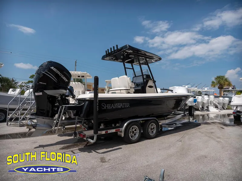 Slide: The Image of 2023 ShearWater 260 Carolina boat on trailer at South Florida Yachts dealership. - 4