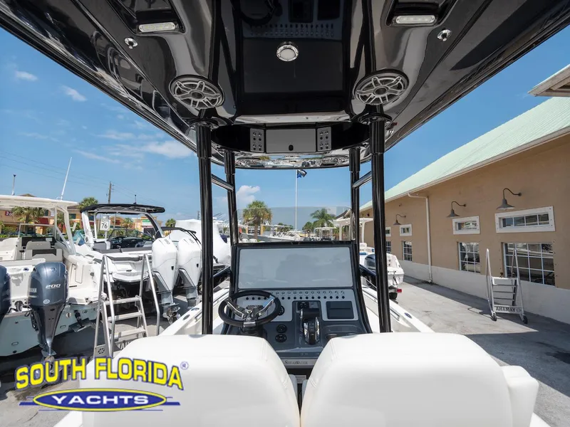 Slide: The Image of 2023 ShearWater 260 Carolina boat interior at South Florida Yachts dealership. - 9