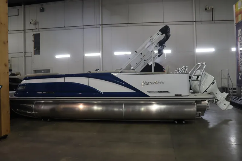 Slide: The Image of 2023 Silver Wave 2210 SW5 RLP pontoon boat in a showroom. - 3