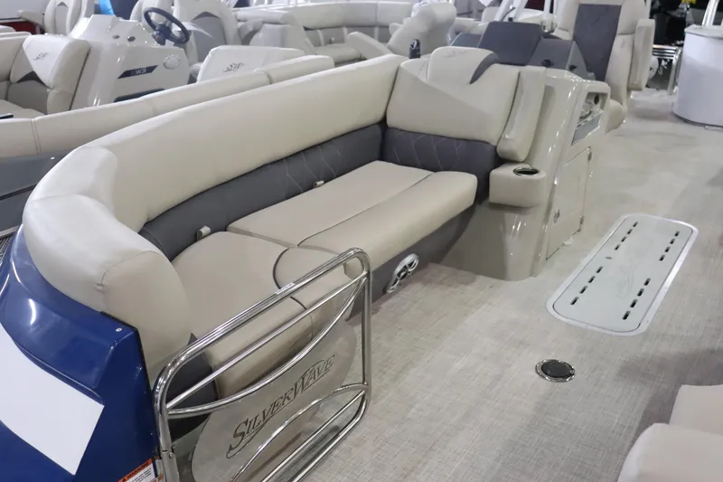 Slide: The Image of 2023 Silver Wave 2210 SW5 RLP boat interior with beige seating and modern design. - 5