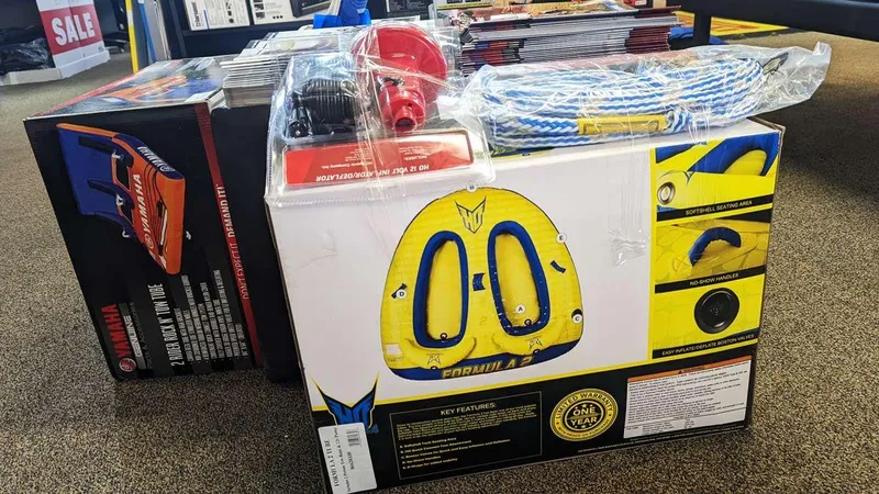 Slide: The Image of Yamaha and HO Sports towable tubes and accessories for water sports, displayed in a store. - 8