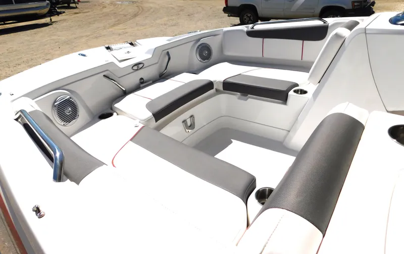 Slide: The Image of Interior seating of a 2023 Tahoe 1950 boat with gray and white upholstery. - 39