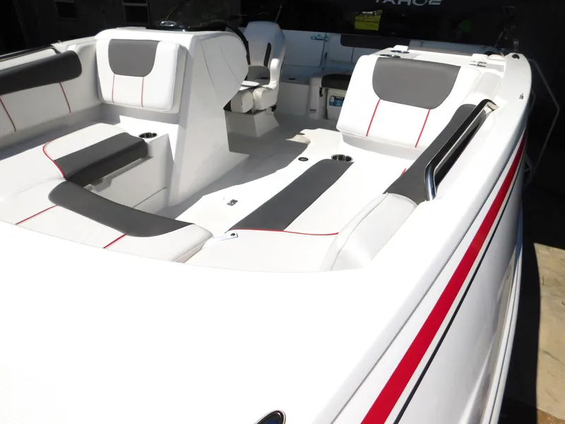 Slide: The Image of 2023 Tahoe 1950 boat interior with white and gray seating, red accents. - 40