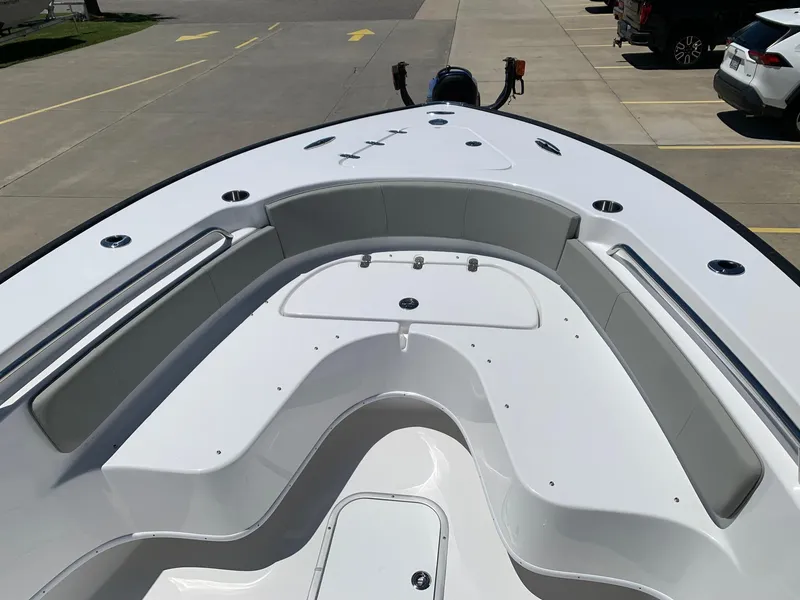 Slide: The Image of 2024 Cape Horn 24 XS boat interior, spacious seating and storage compartments. - 22