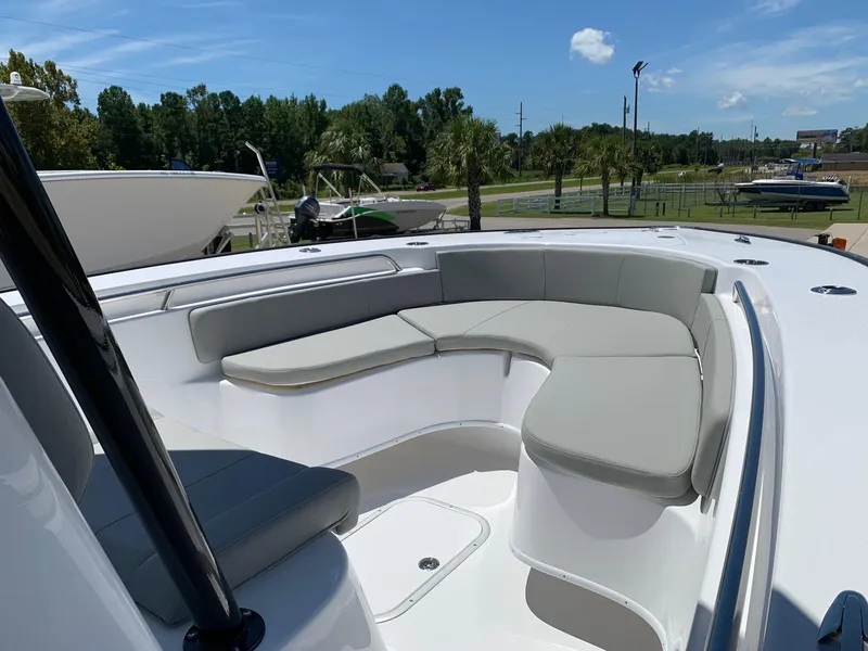 Slide: The Image of 2024 Cape Horn 24 XS boat with spacious seating area and modern design. - 7