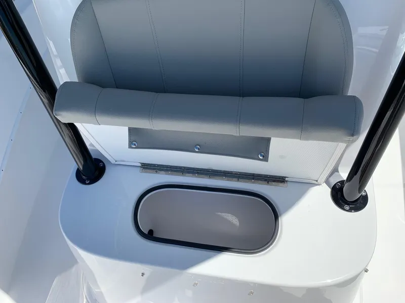 Slide: The Image of 2024 Cape Horn 24 XS boat seating and storage compartment. - 18