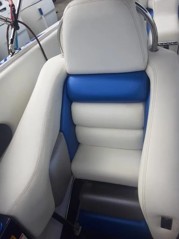 Slide: The Image of 2006 Donzi 43 ZR boat seat with white and blue upholstery. - 19