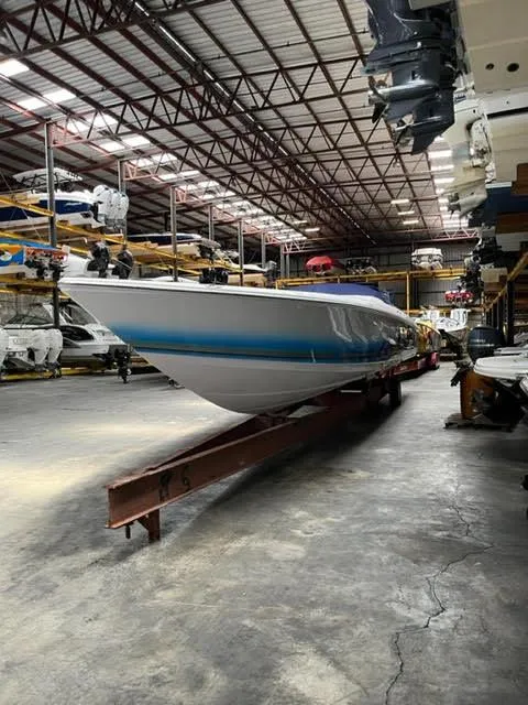 Slide: The Image of 2006 Donzi 43 ZR speedboat in a storage facility. - 3