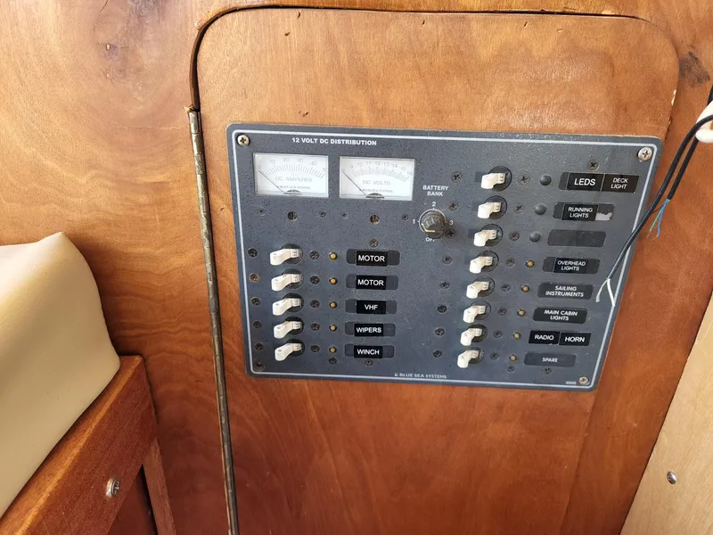 Slide: The Image of Electrical panel on 1980 Tuna Rose Brothers boat with switches and meters. - 18