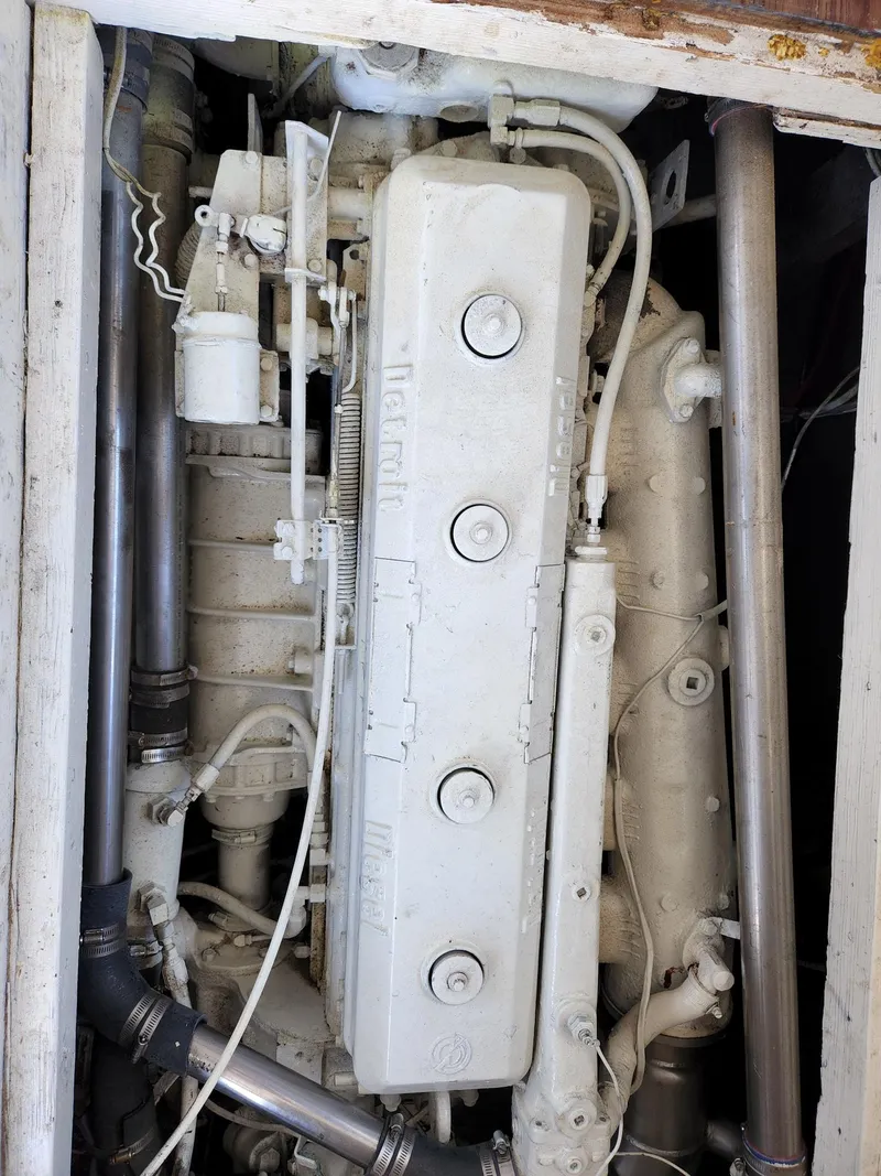 Slide: The Image of 1980 Tuna Rose Brothers engine, detailed view of mechanical components and pipes. - 29