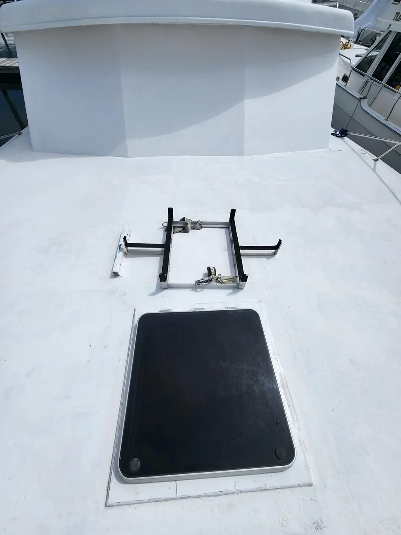 Slide: The Image of 1980 Tuna Rose Brothers boat deck with hatch and metal frame. - 6