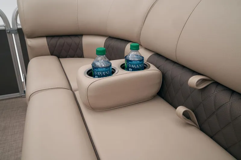 Slide: The Image of 2023 Sun Tracker Party Barge 22 RF DLX seating with built-in cup holders. - 24