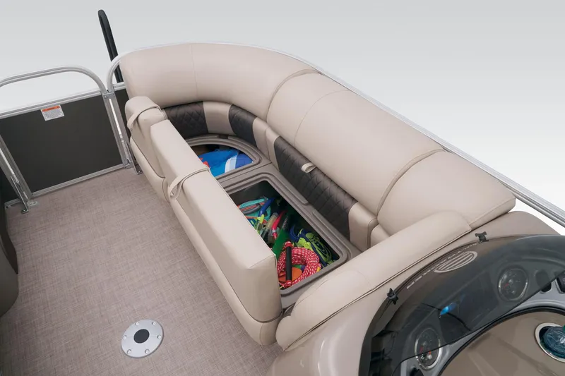 Slide: The Image of 2023 Sun Tracker Party Barge 22 RF DLX interior storage compartment with toys. - 27