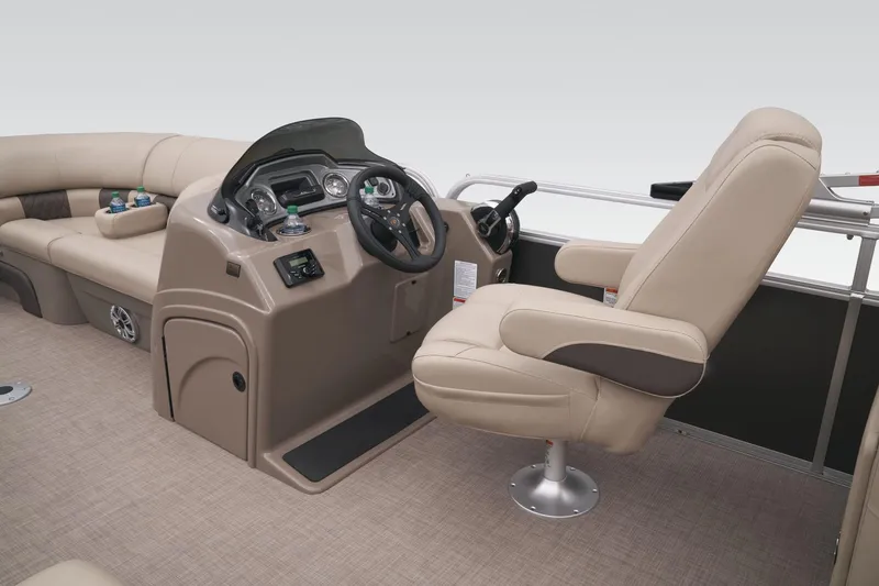 Slide: The Image of 2023 Sun Tracker Party Barge 22 RF DLX interior with captain's chair and control console. - 32