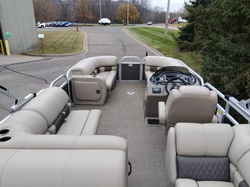 Slide: The Image of 2023 Sun Tracker Party Barge 22 RF DLX with spacious seating and modern design. - 6