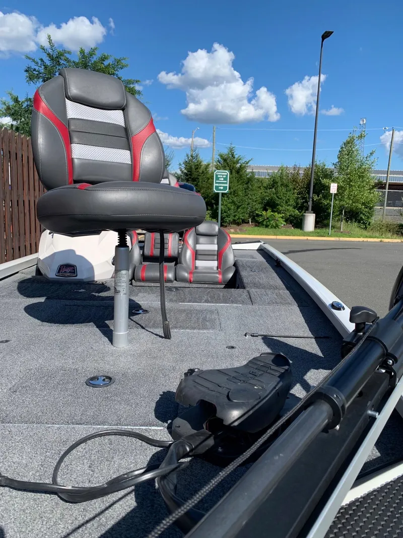 Slide: The Image of 2021 Ranger RT188C fishing boat with seating and equipment on deck. - 3