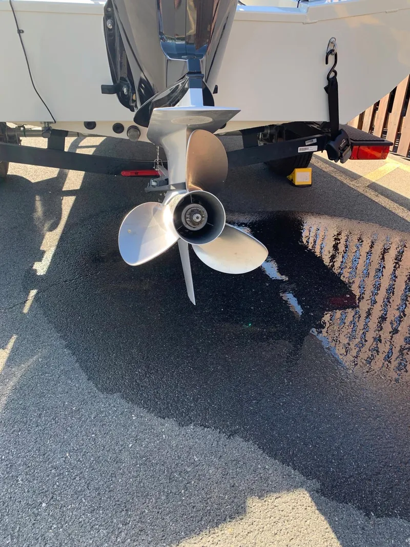 Slide: The Image of 2021 Ranger RT188C boat propeller and motor on a trailer. - 5
