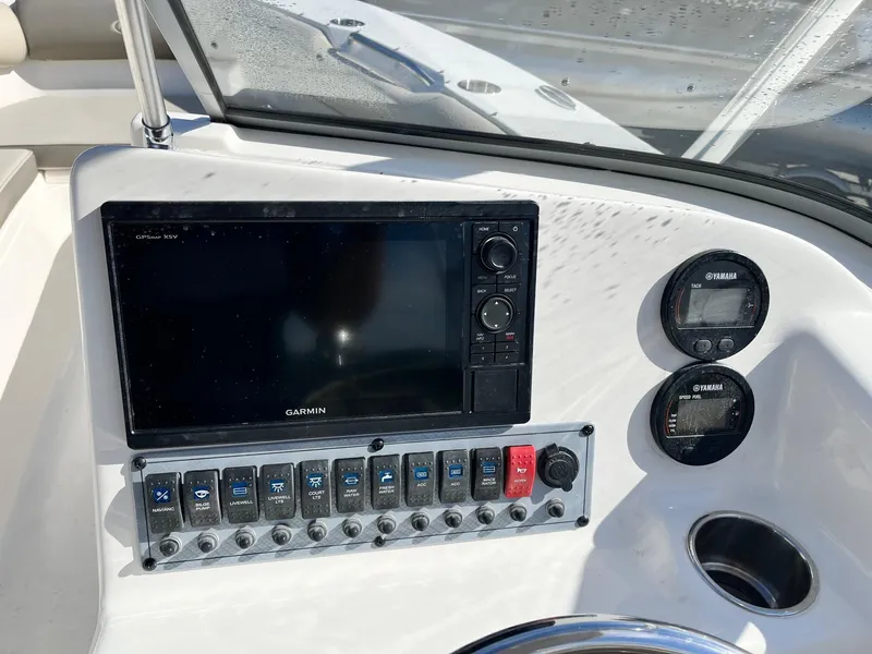 Slide: The Image of Dashboard of 2024 Key West 239 DFS boat with Garmin navigation system. - 5