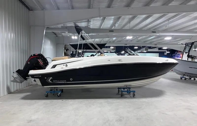 Slide: The Image of 2024 Bayliner VR5 boat in showroom, side view. - 0