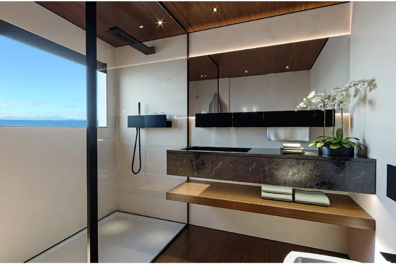 Slide: The Image of Modern bathroom on the 2023 Wider 92 yacht with ocean view, sleek fixtures, and minimalist design. - 6