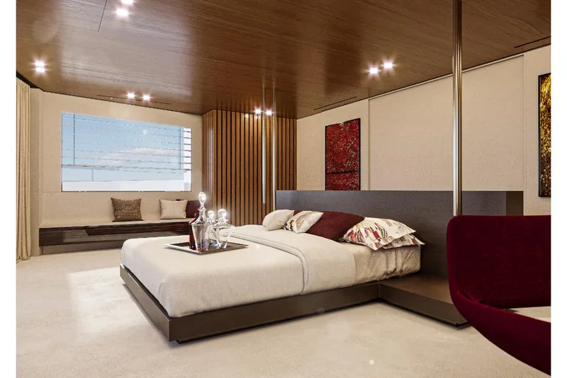 Slide: The Image of Modern bedroom interior on Wider 92 yacht, 2023 model, featuring a large bed, contemporary decor, and a scenic window view. - 8
